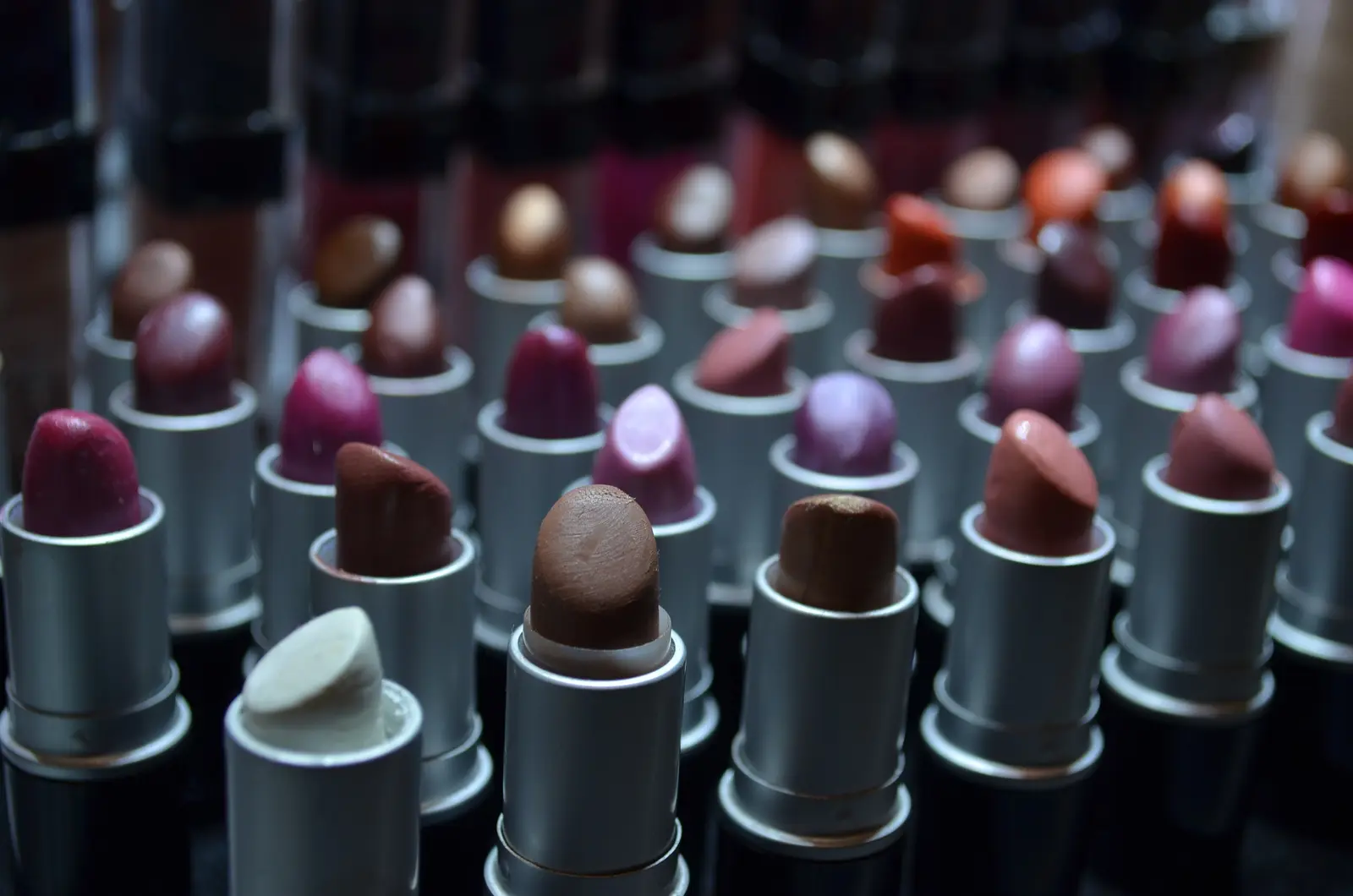 Rows of lipsticks in red, pink, plum and nude shades